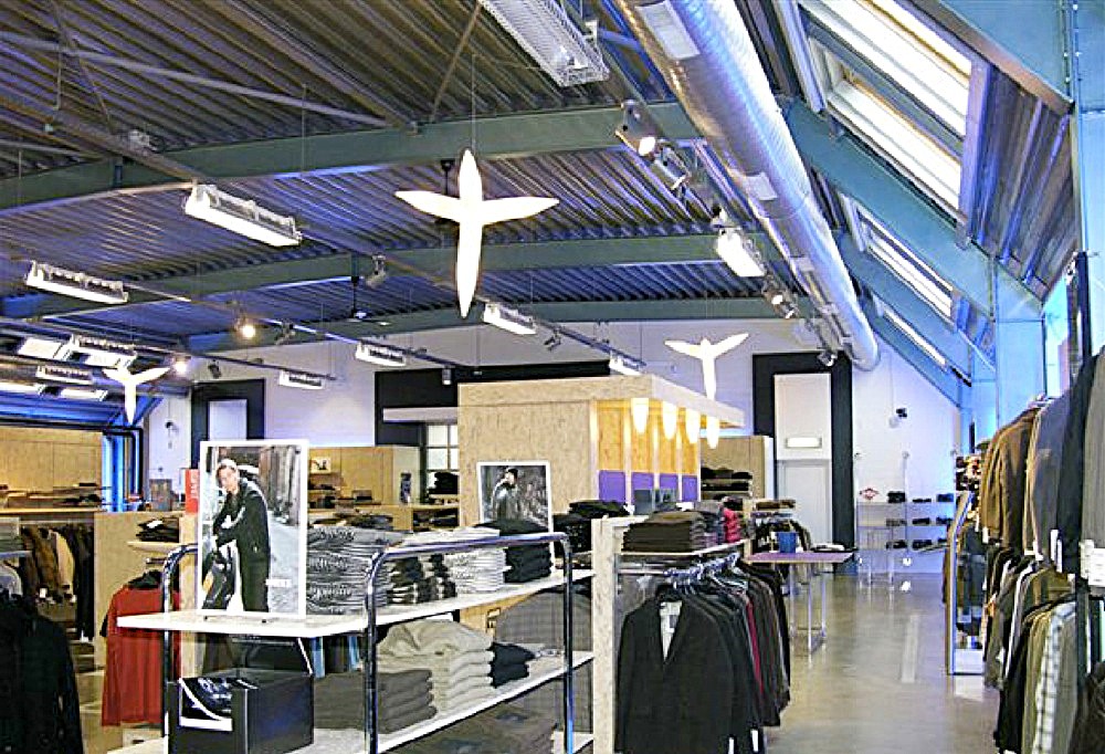 Rommens fashion store in an open hall with skylights