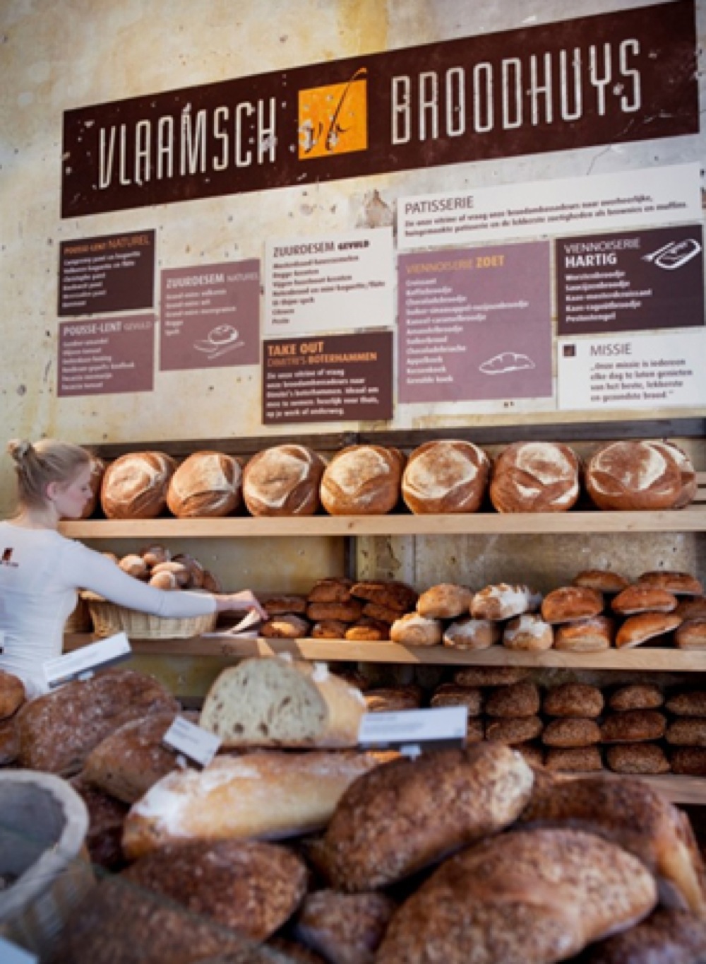 Vlaamsch Broodhuys bread display with sourdough loaves
